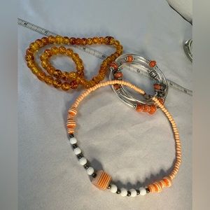 Orange bracelet and necklaces